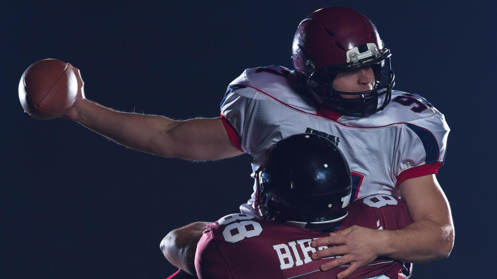 American-Football-Spieler in Aktion foto