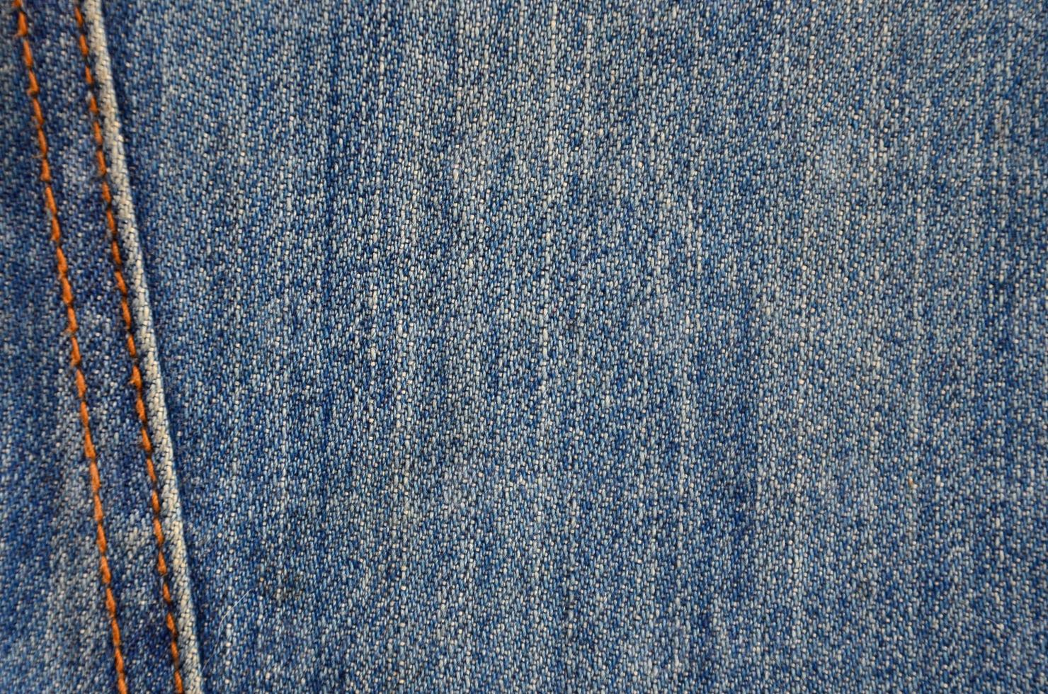 detaillierte textur aus dunklem jeansstoff foto