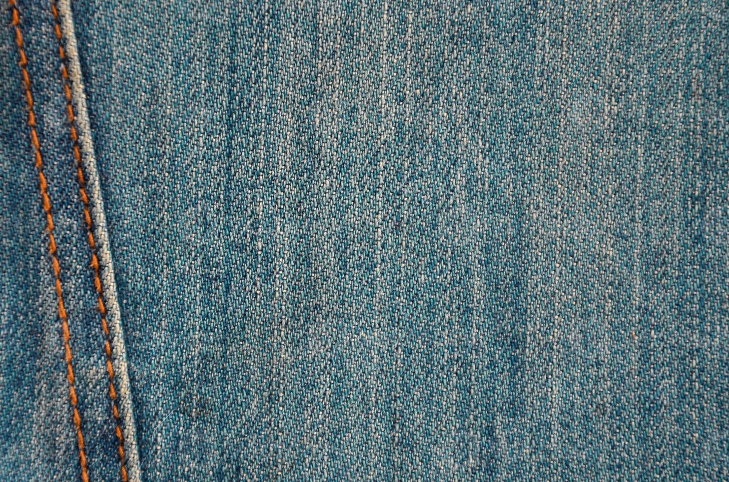 detaillierte textur aus dunklem jeansstoff foto