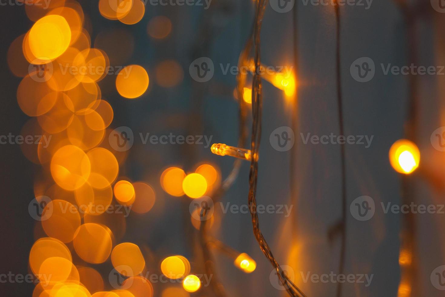 abstrakter goldener bokeh heller weihnachtsfeiertagshintergrund foto