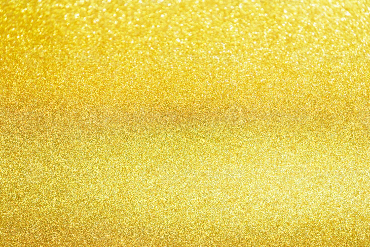 abstraktes goldglitter funkeln mit bokeh hellem hintergrund foto