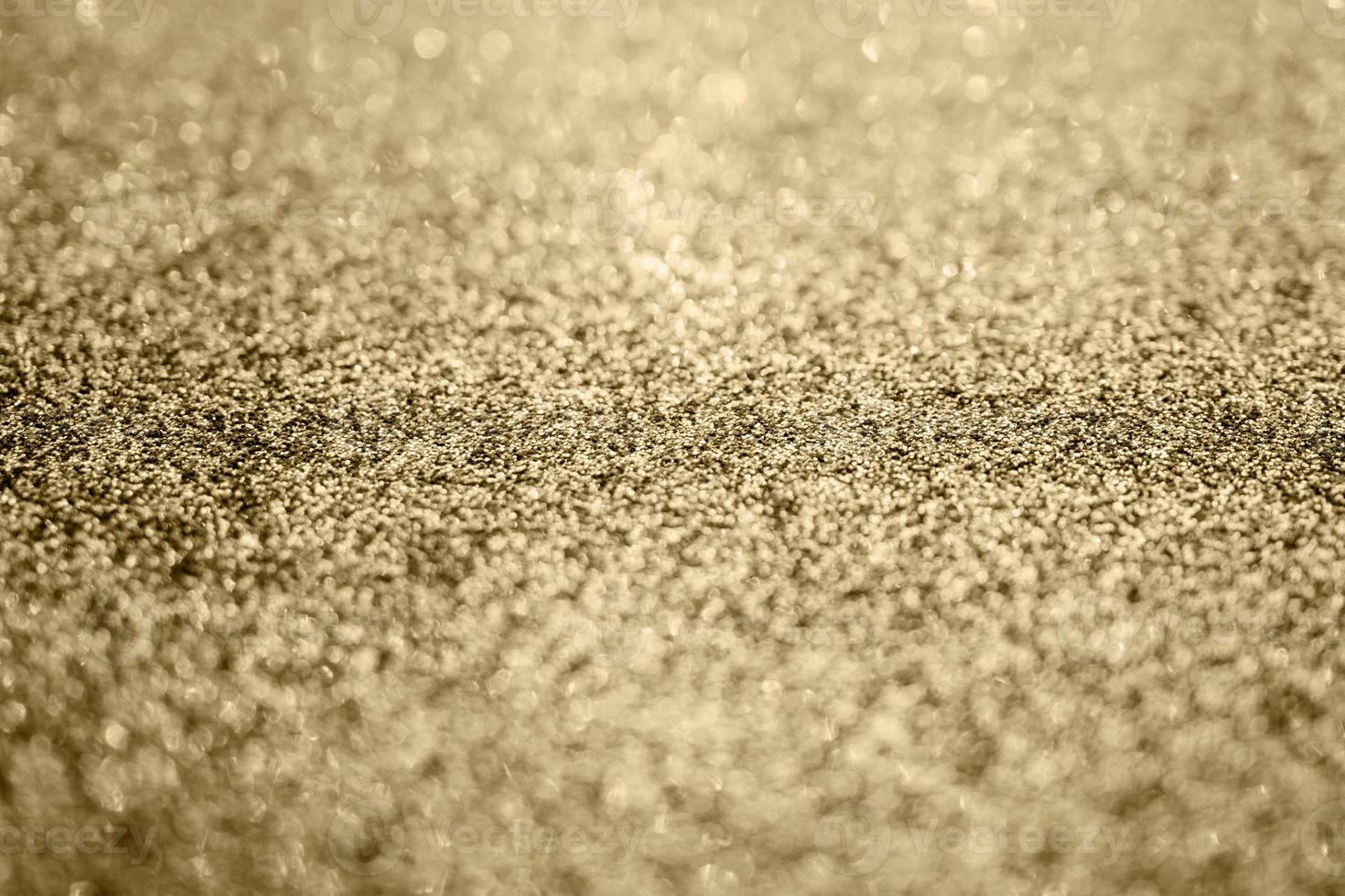 abstrakter goldglitter funkeln textur hintergrund foto