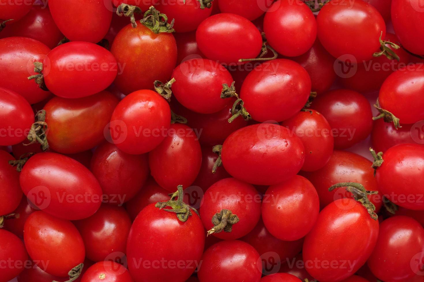 roter reifer Bio-Tomate-Hintergrund foto