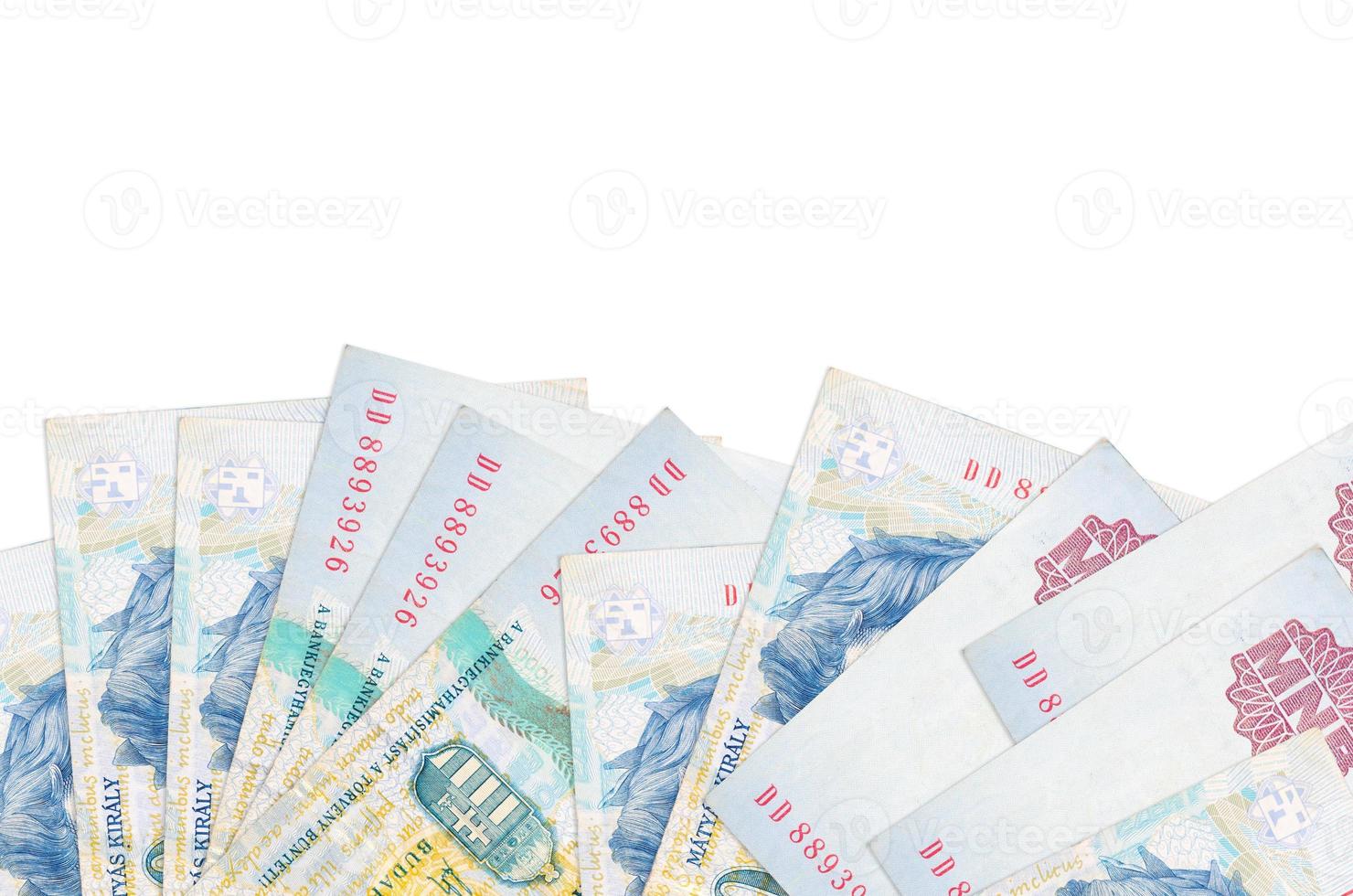 1000 ungarische Forint-Scheine liegen auf der Unterseite des Bildschirms isoliert auf weißem Hintergrund mit Kopierraum. Hintergrund-Banner-Vorlage foto