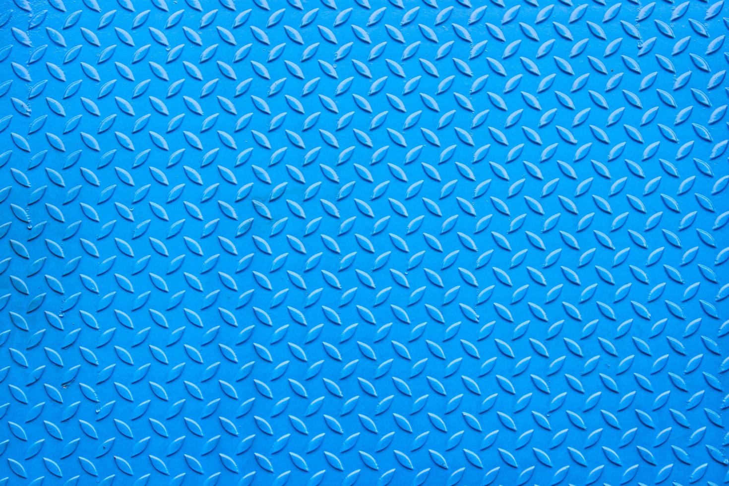 blauer Riffelblechhintergrund und Textur für den Boden aus Stahlarbeiten foto