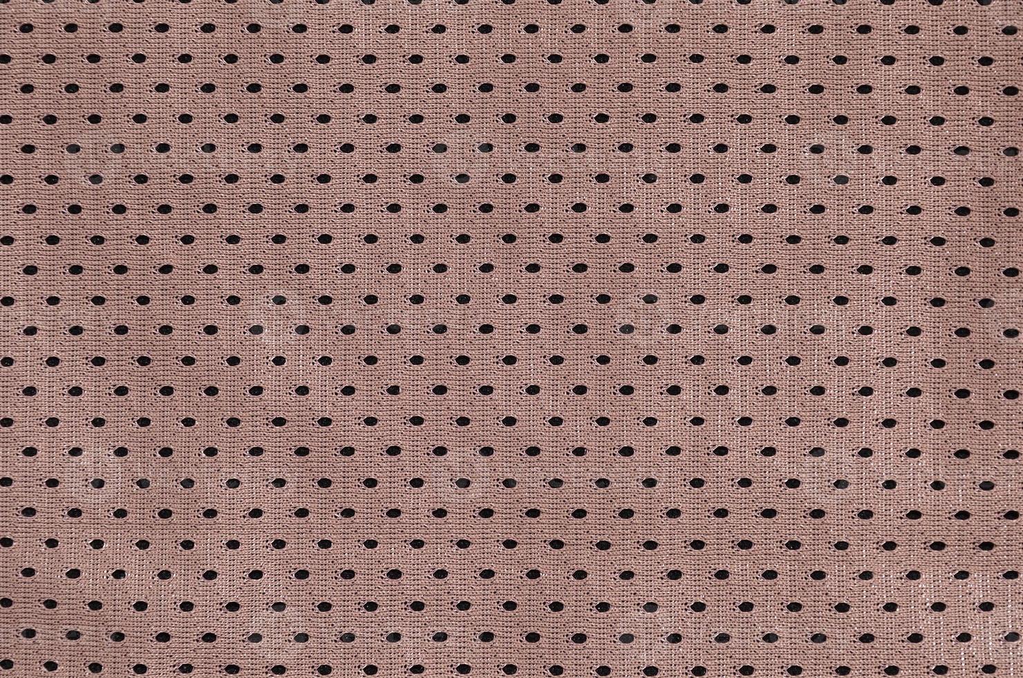 textur von sportbekleidung aus polyesterfasern. Oberbekleidung für das Sporttraining hat eine Maschenstruktur aus dehnbarem Nylongewebe foto