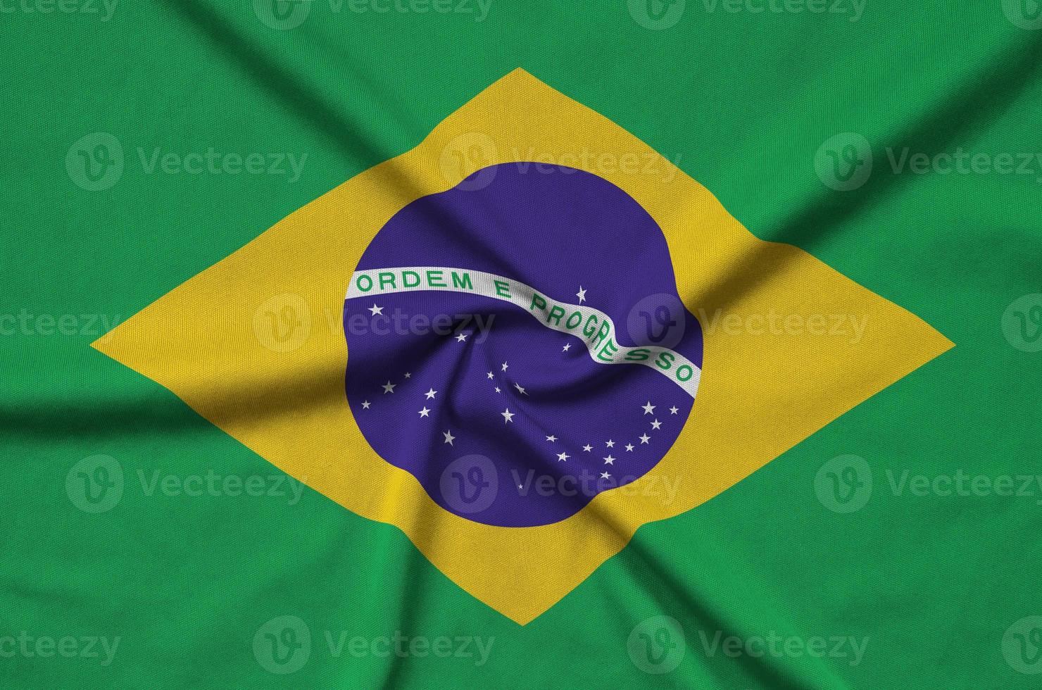 die brasilienflagge ist auf einem sportstoff mit vielen falten abgebildet. Sportteam-Banner foto