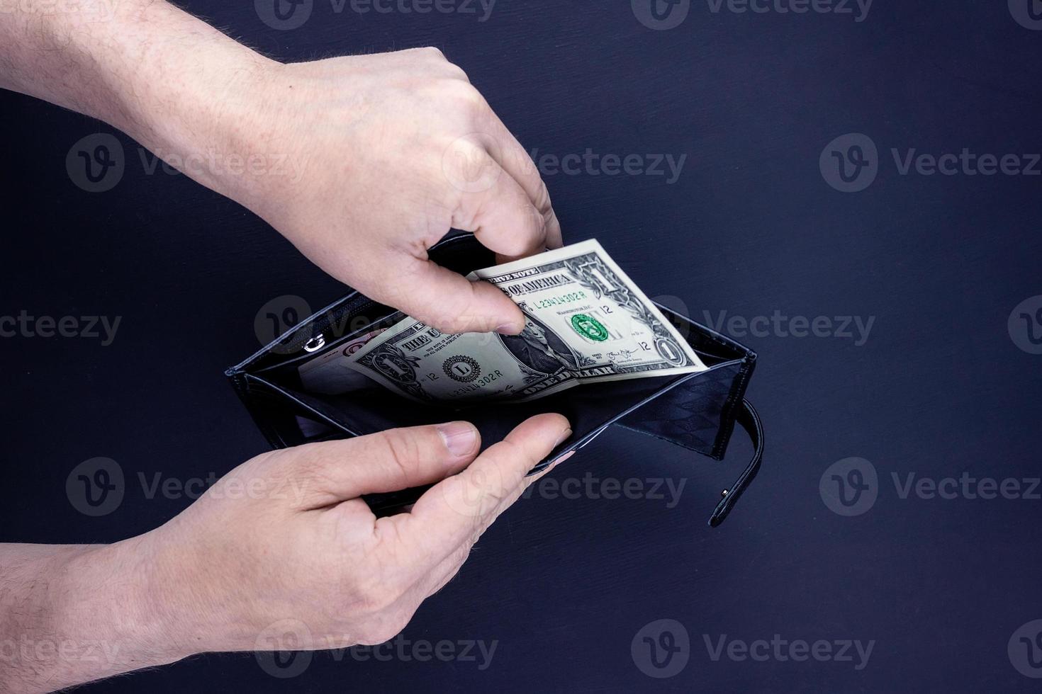 Dollar in Ihrem Portemonnaie foto