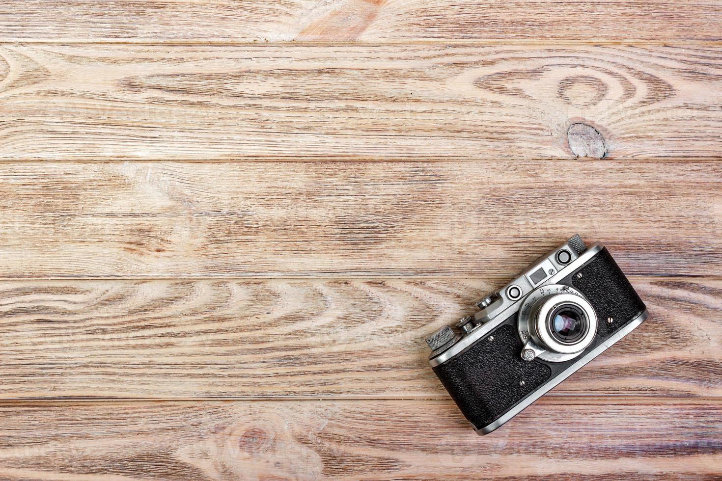 alte Kamera auf Holzboden im Vintage-Stil foto