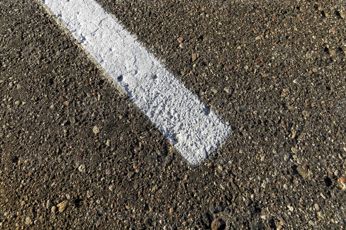 Nahaufnahme einer asphaltierten Straße foto