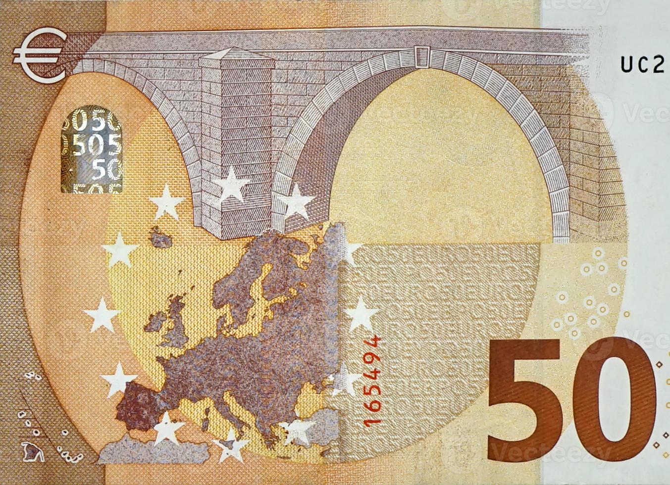 Fragmentteil einer 50-Euro-Banknote, Nahaufnahme mit kleinen braunen Details foto