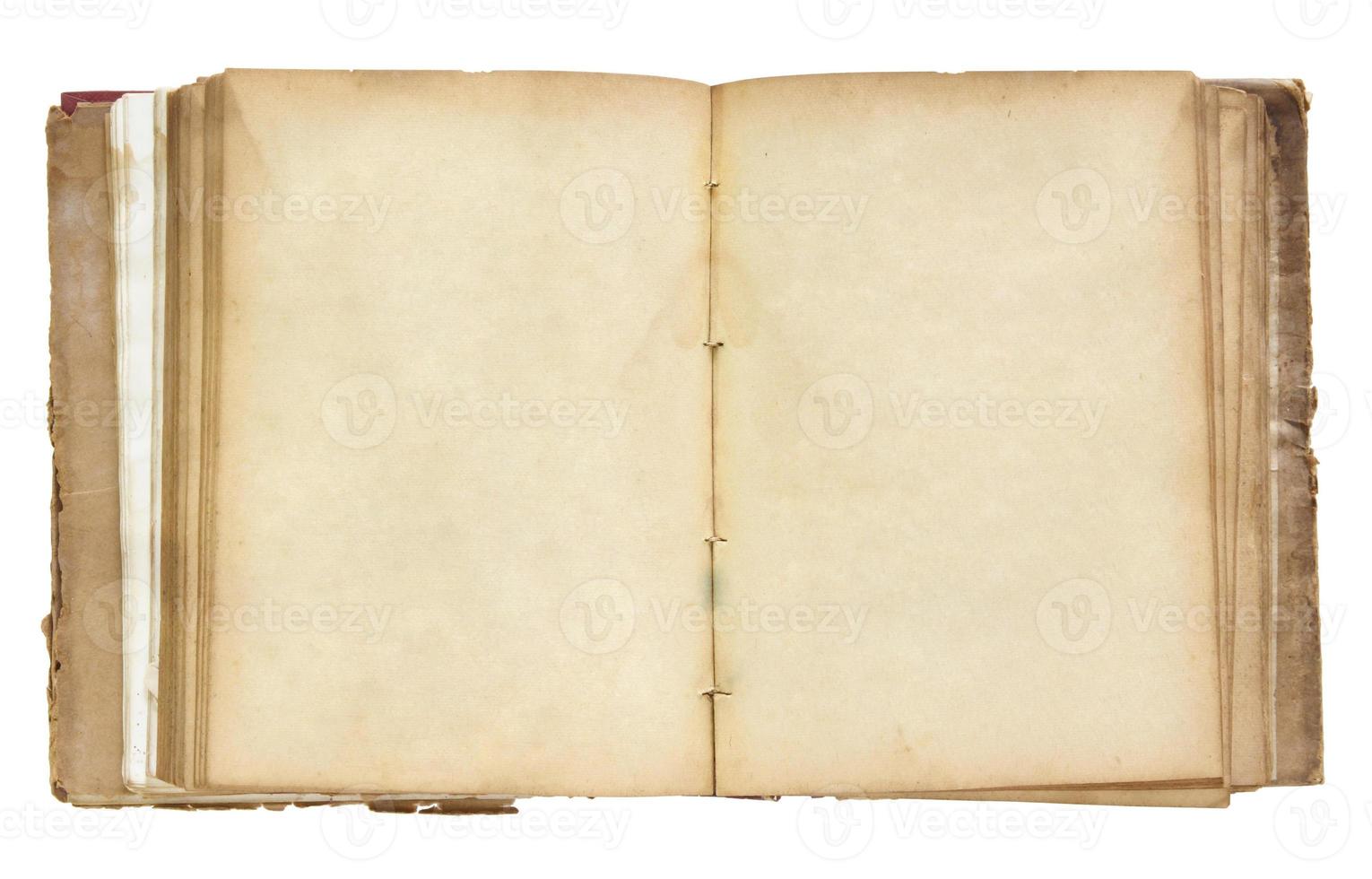 altes Buch offen isoliert auf weißem Hintergrund foto