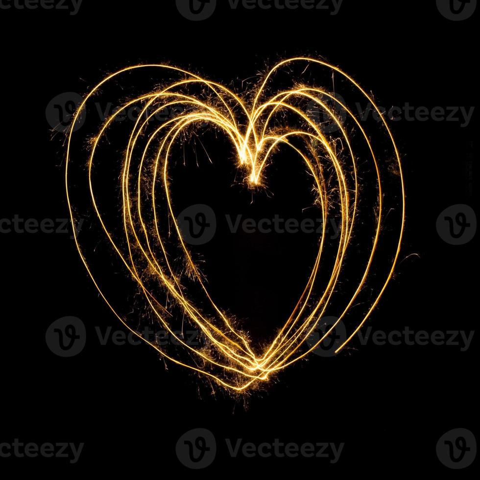 Wunderkerze Feuerwerk Licht mit Herzform. foto