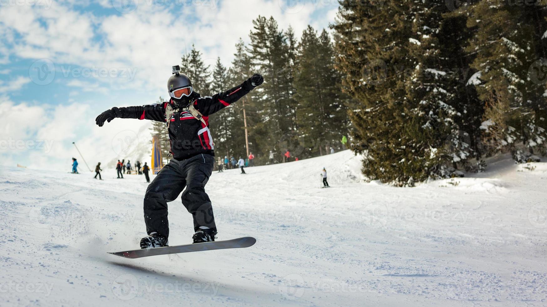 Snowboarder-Sprungblick foto