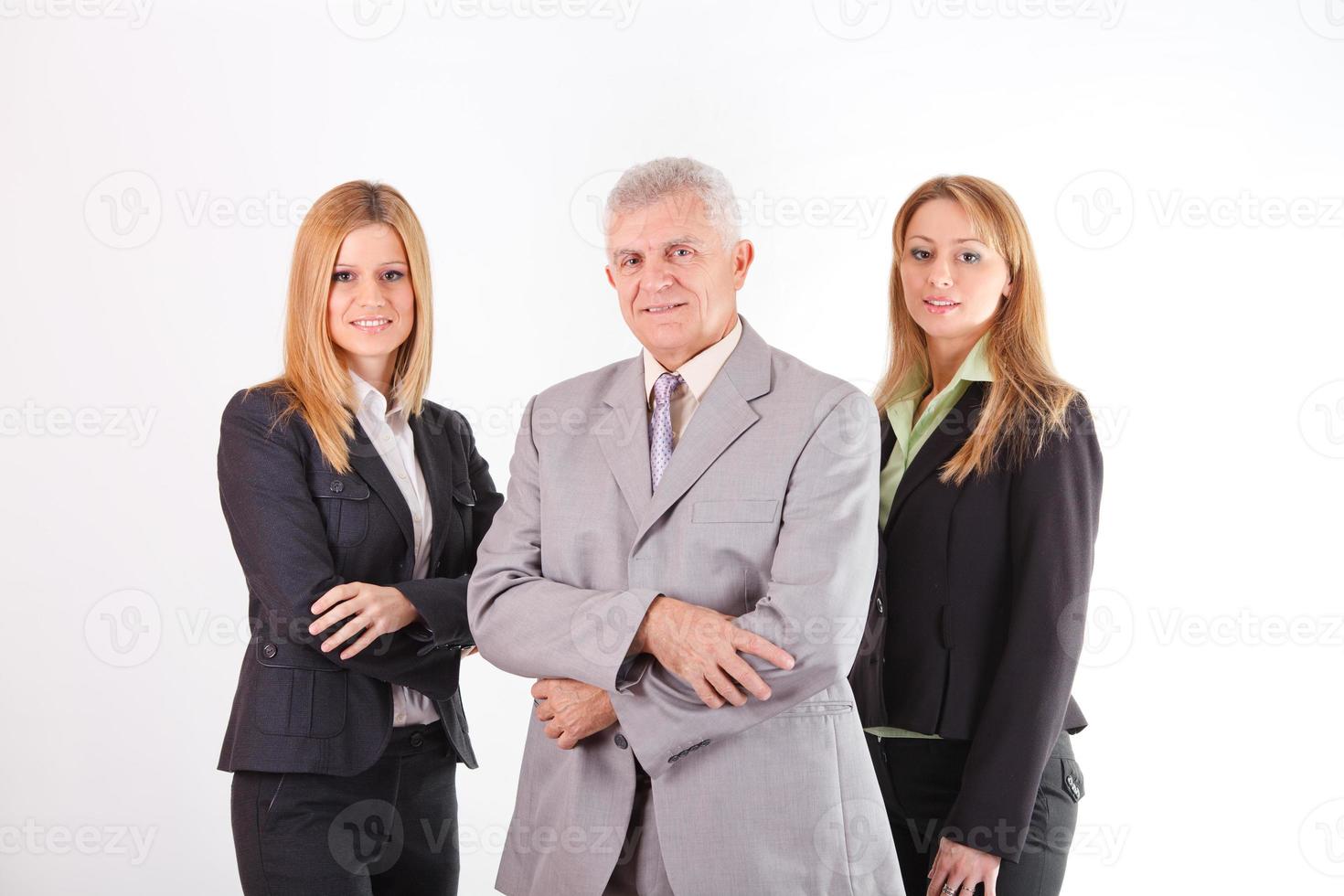 erfolgreicher Senior Manager mit zwei Kolleginnen foto