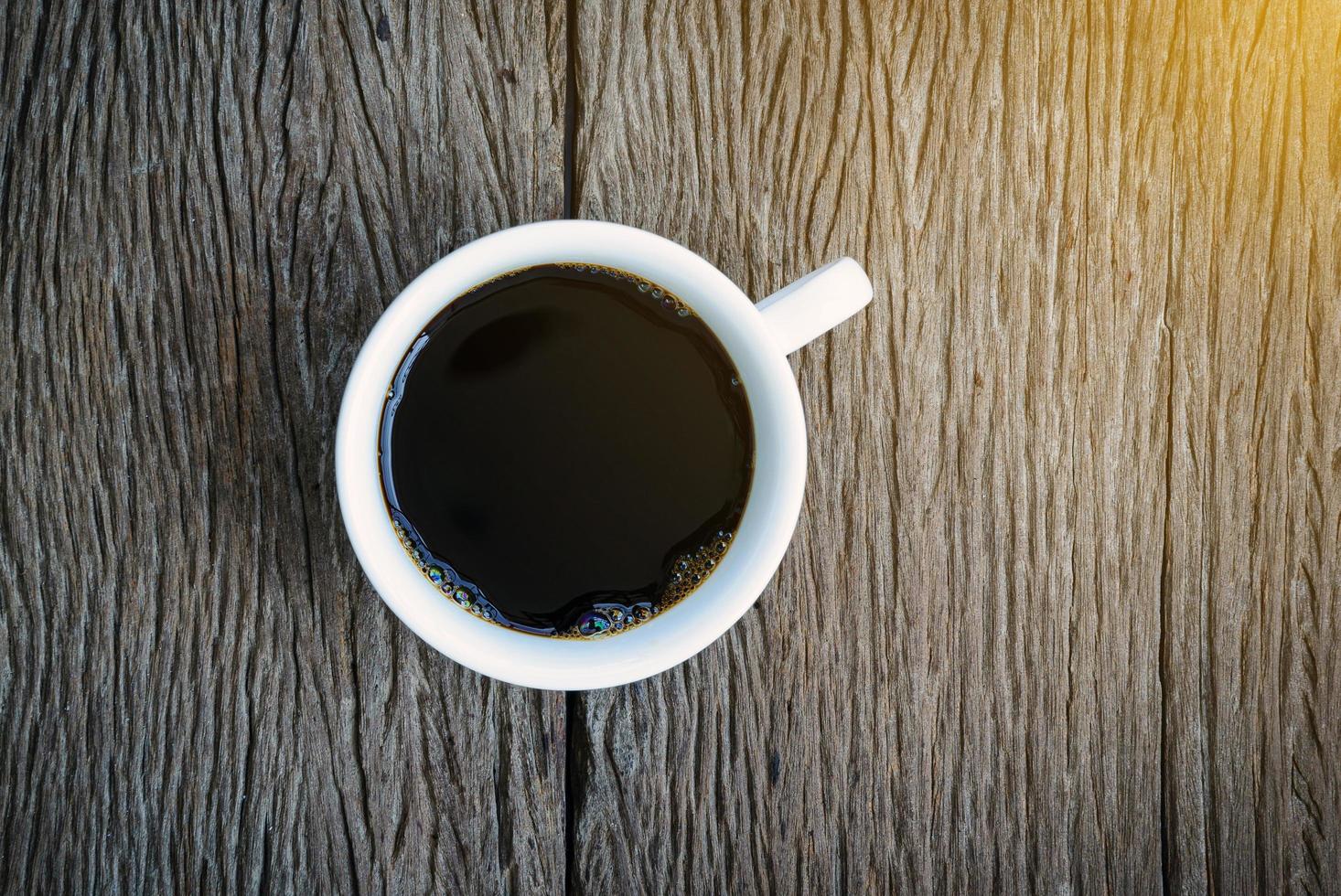 Draufsicht des Kaffees auf hölzernem Hintergrund foto