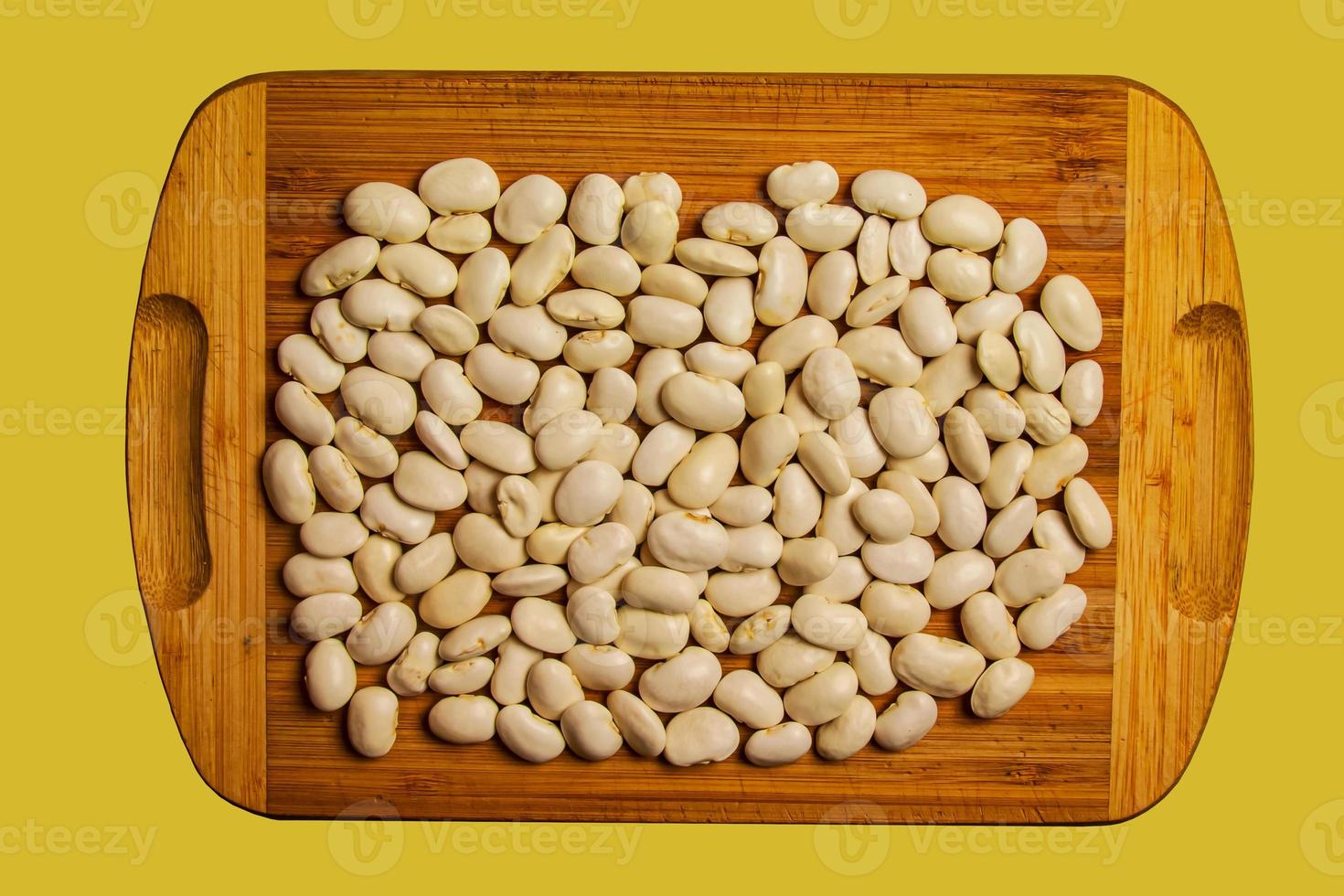 Hintergrund aus weißen Gartenbohnen Bohnen. Textur aus rohen Bohnensamen. gesundes lebensmittelkonzept. foto