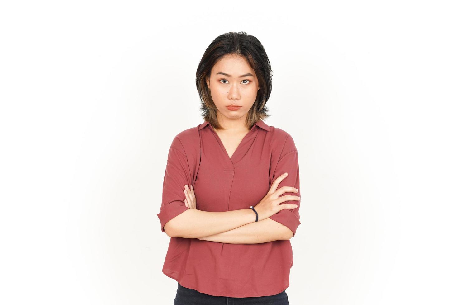 Wütende Geste der schönen Asiatin isoliert auf weißem Hintergrund foto
