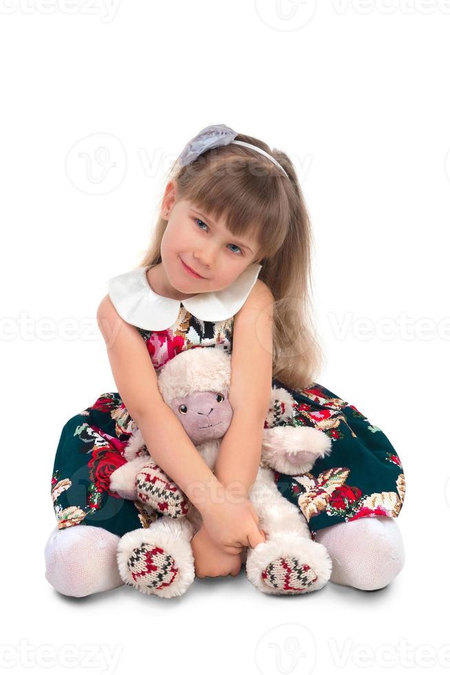 kleines Mädchen in einem Kleid foto