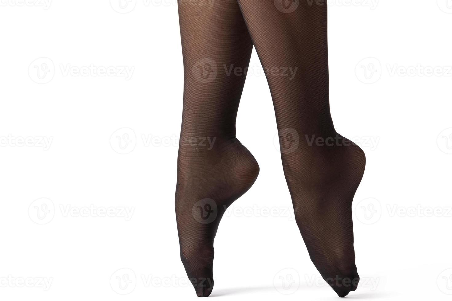 schöne weibliche beine in schwarzen strümpfen foto