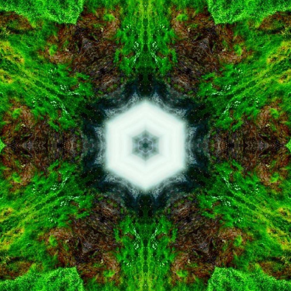 glänzender und hypnotisierender bunter Kaleidoskophintergrund foto