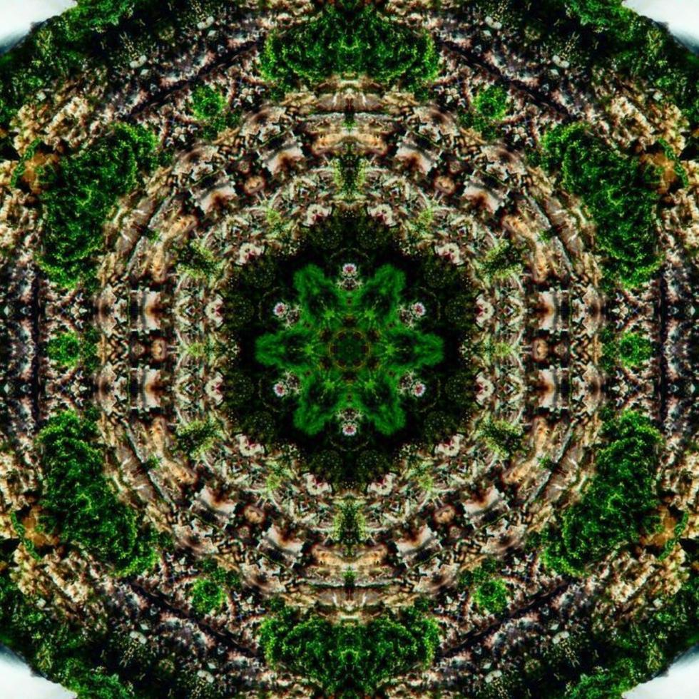 glänzender und hypnotisierender bunter Kaleidoskophintergrund foto