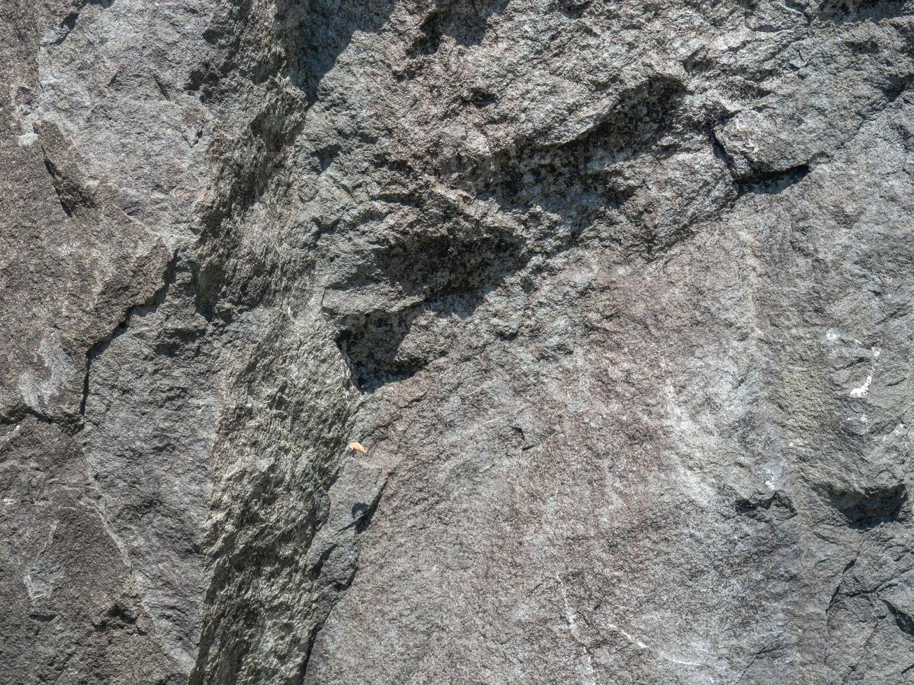 Struktur aus schwarzem Stein. Hintergrund . festes Naturmaterial. foto