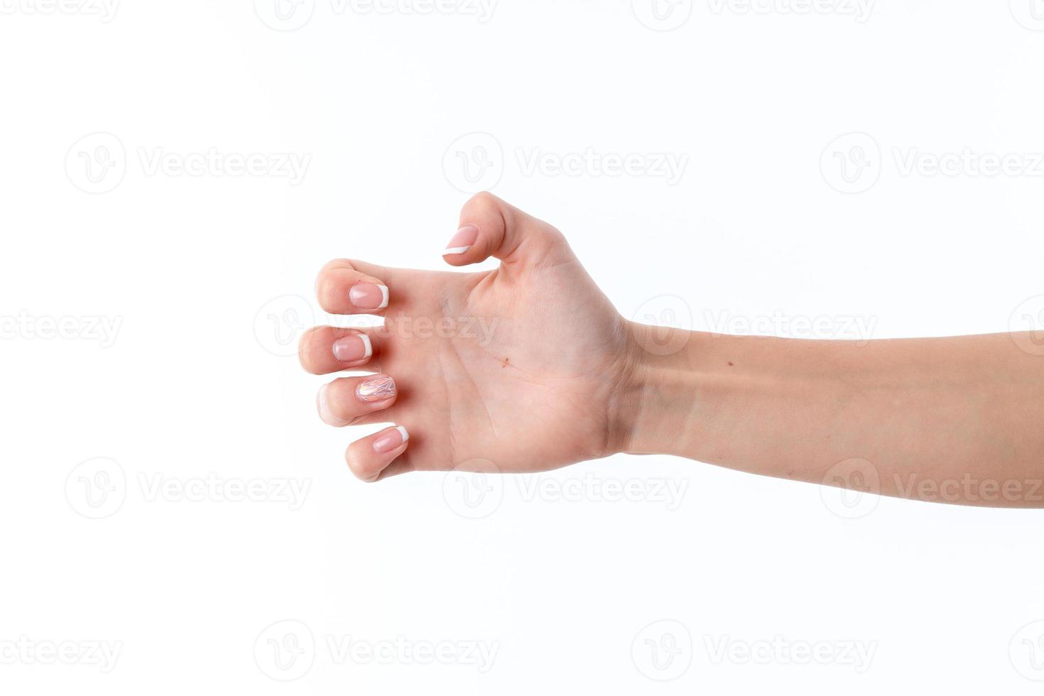 Die weibliche Hand wird mit gebogenen Fingern seitwärts gedreht foto