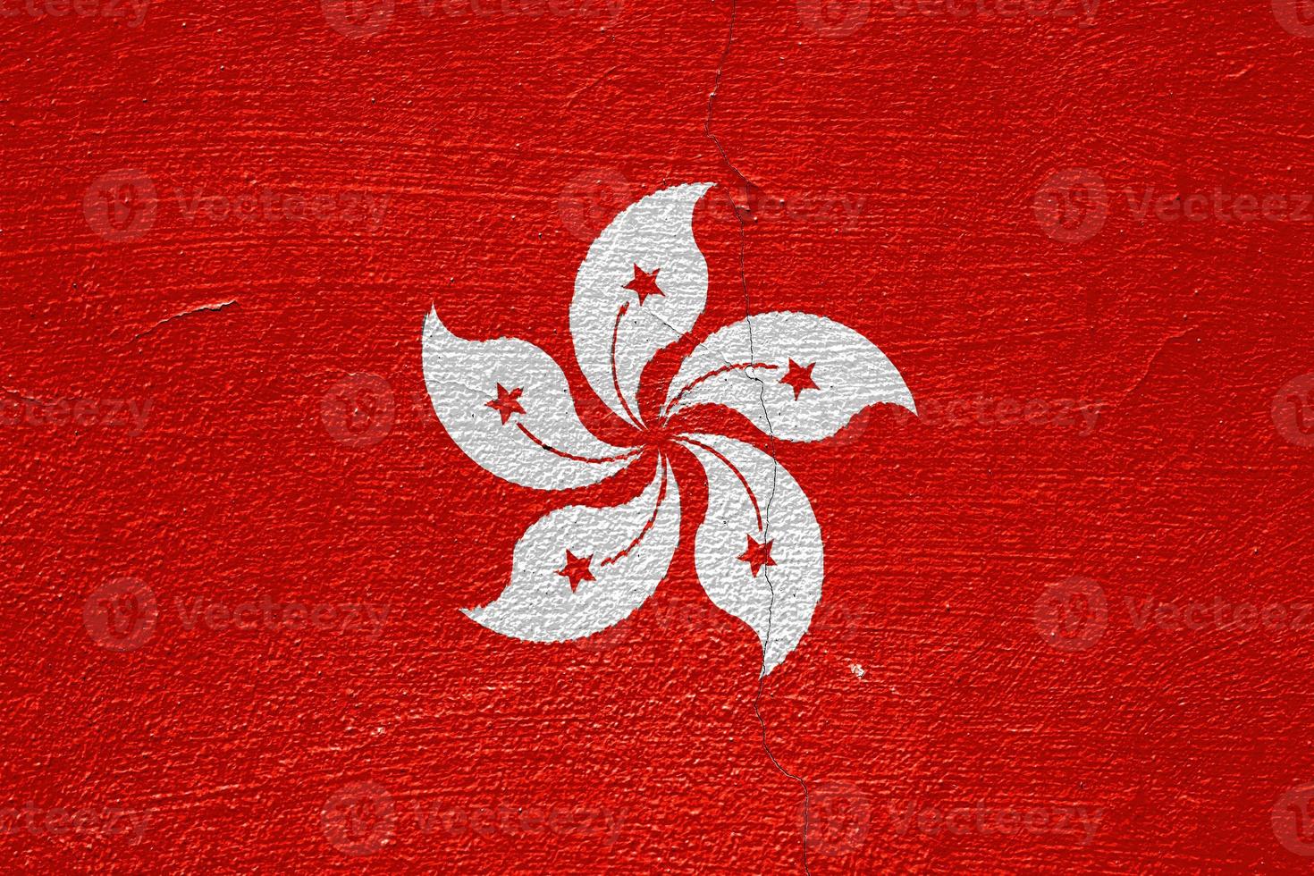 Hongkong-Flagge auf einem strukturierten Hintergrund. Konzept-Collage. foto