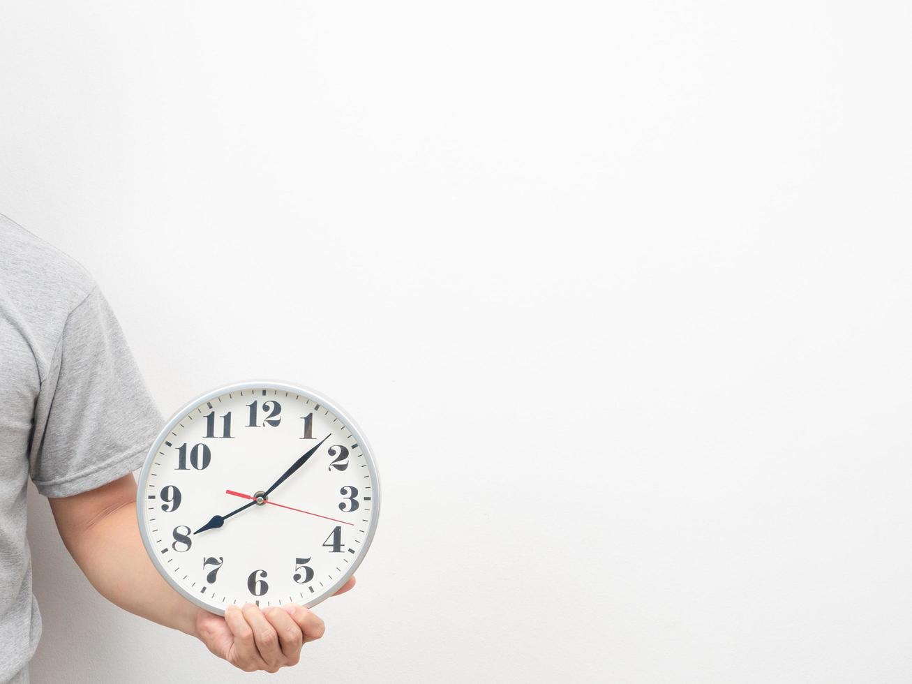 Mann Hand analog Uhr kopieren Raum weißen Hintergrund foto