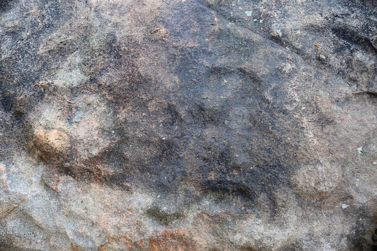 Nahaufnahme einer Granit- und Steinwandstruktur in hoher Auflösung. foto