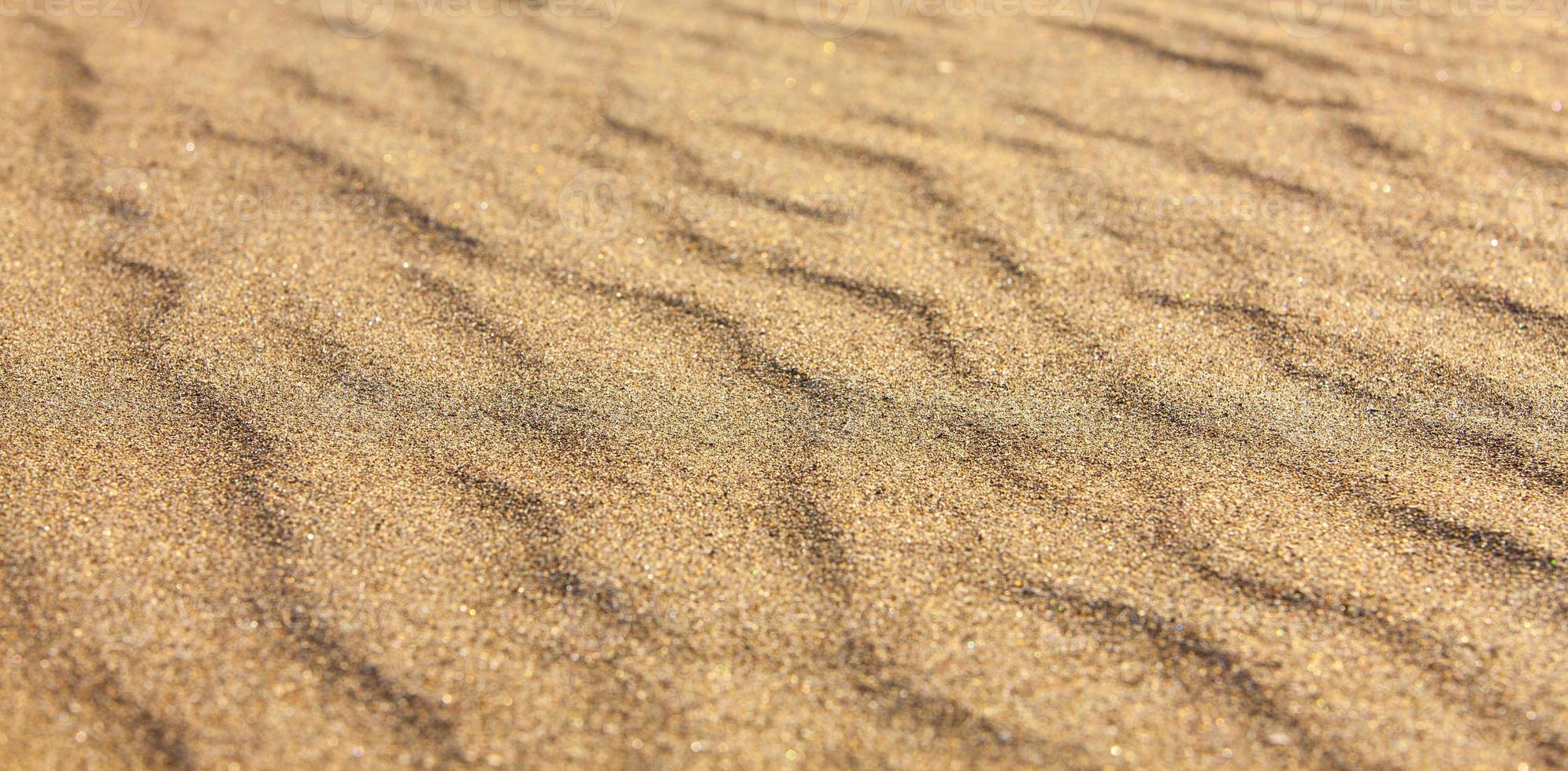 gelber Sand Nahaufnahme als Textur. selektiver Fokus foto