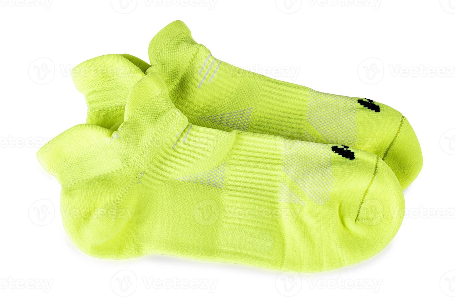 neue grüne Sportsocken isoliert auf weißem Hintergrund foto