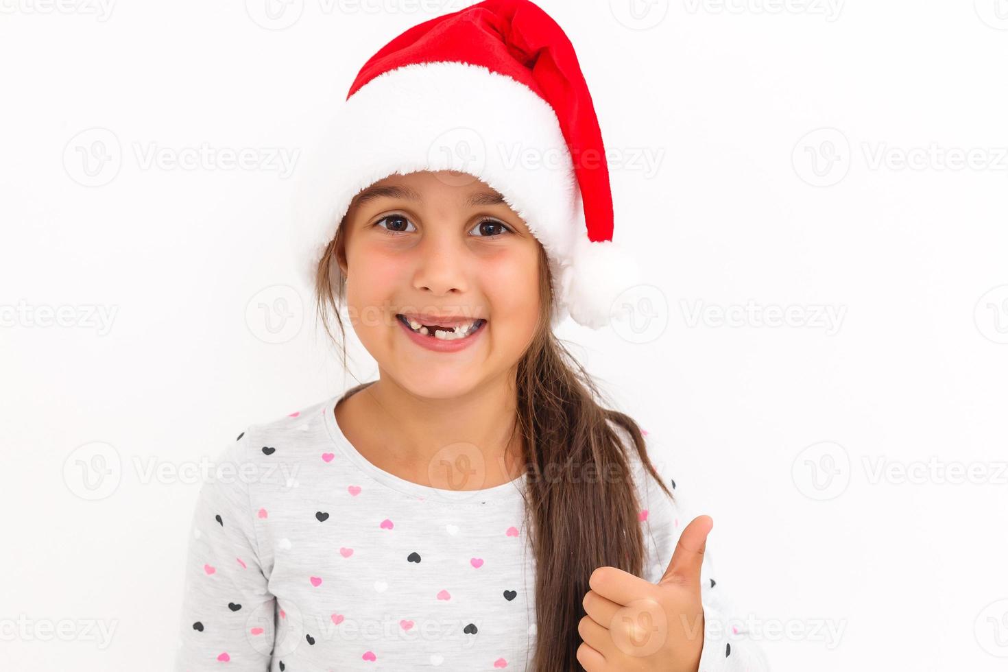 kleines Mädchen Santa isoliert weiß foto