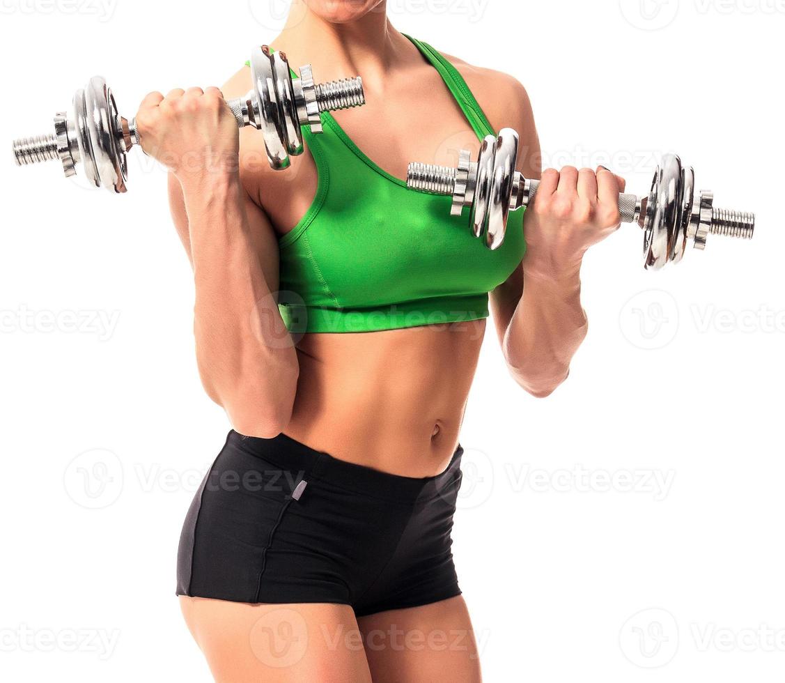 Fitness-Frau mit Langhanteln auf weißem Hintergrund, isoliert foto