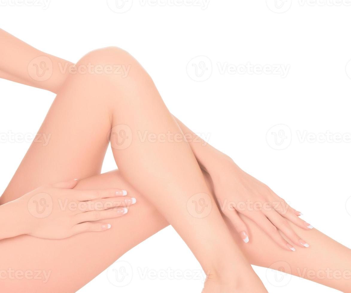 weibliche Beine und Hände foto