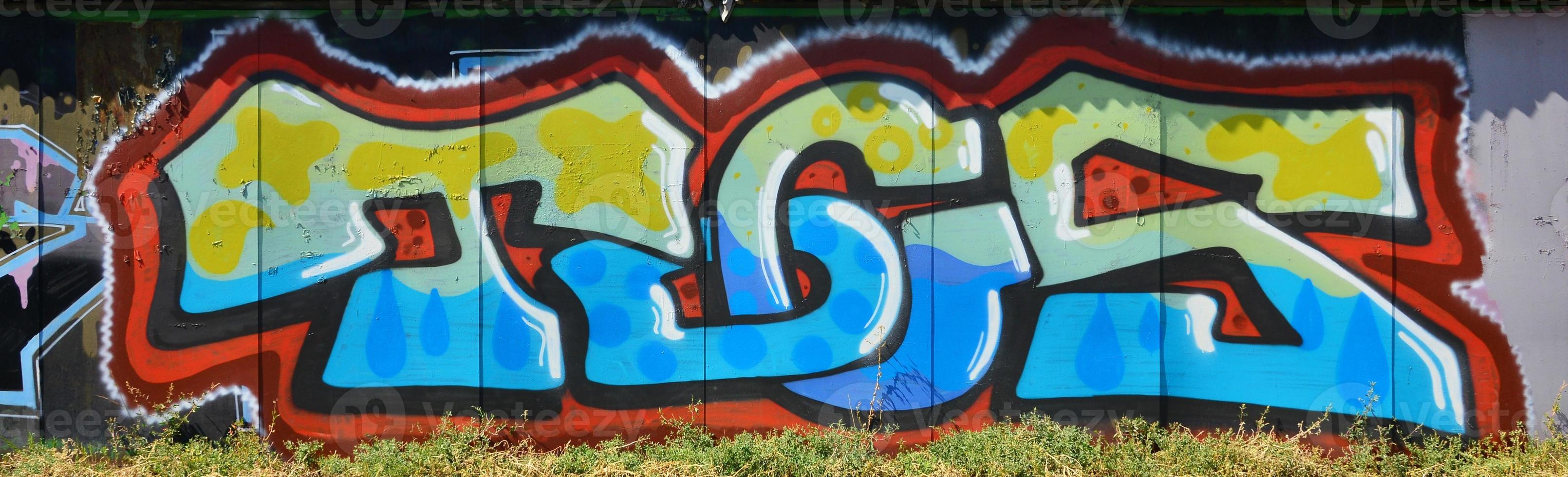 die alte mauer, bemalt in farbe graffiti zeichnen blaue sprayfarben. Hintergrundbild zum Thema Zeichnen von Graffiti und Street Art foto