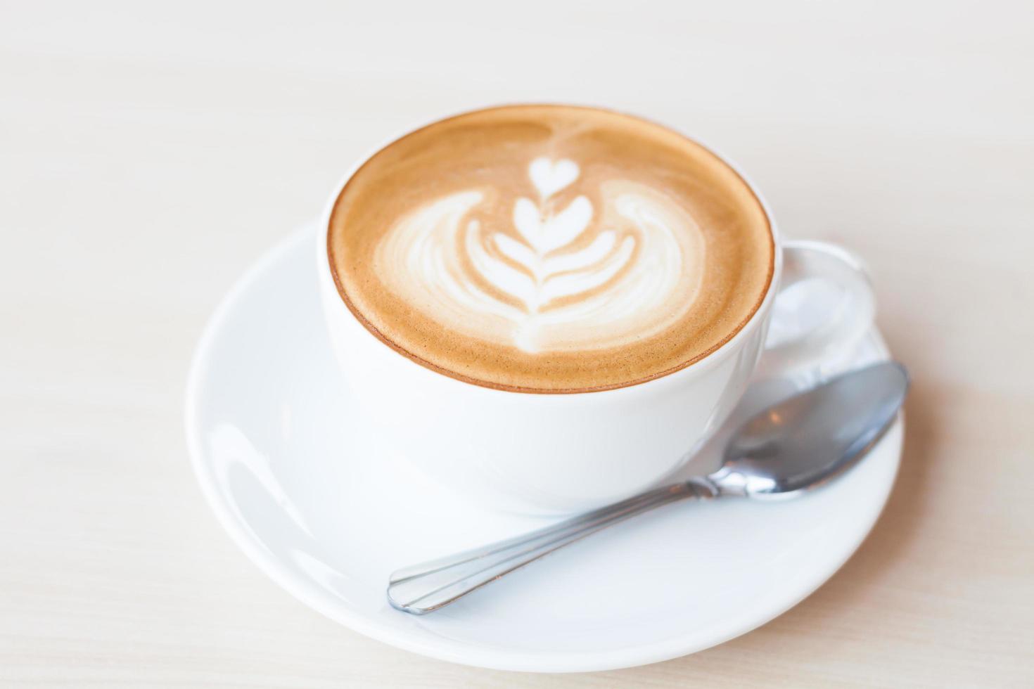 Kaffeetasse mit Latte Art foto