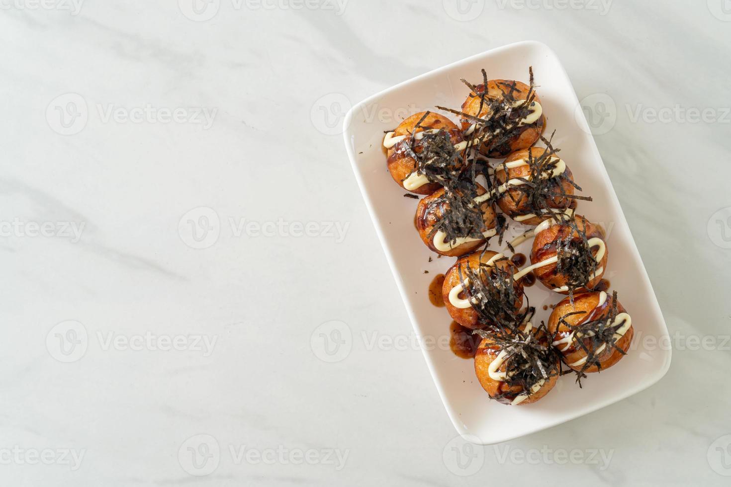 Takoyaki-Kugelknödel oder Oktopus-Kugeln foto