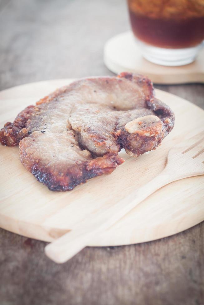 Schweinesteak Mahlzeit foto