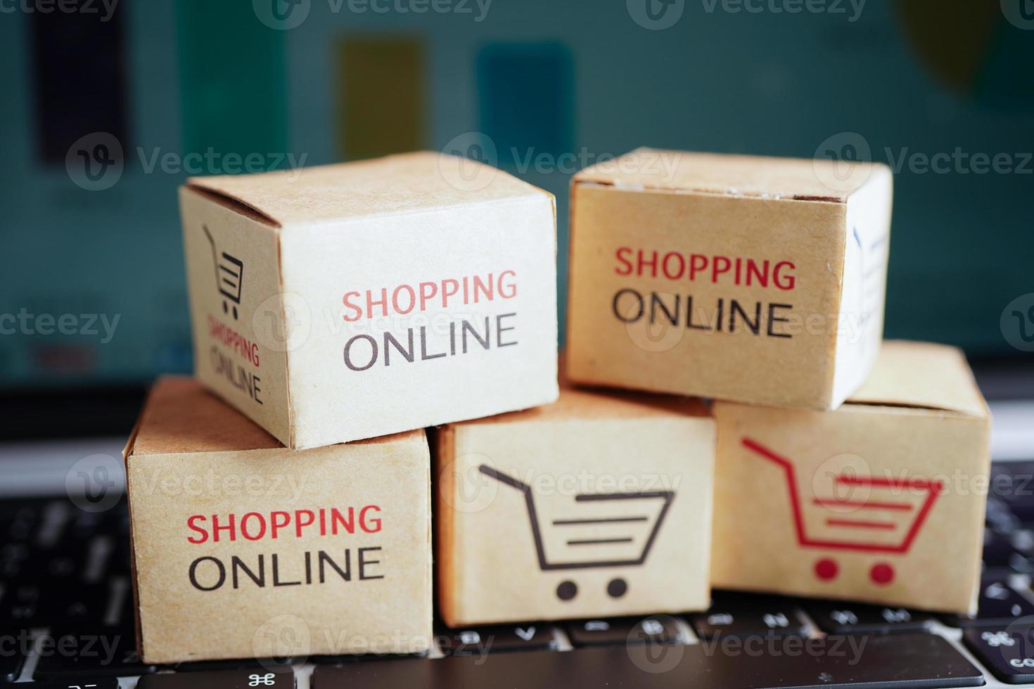 online-shopping, einkaufswagenbox auf geschäftsgrafik, import export, finanzhandel. foto