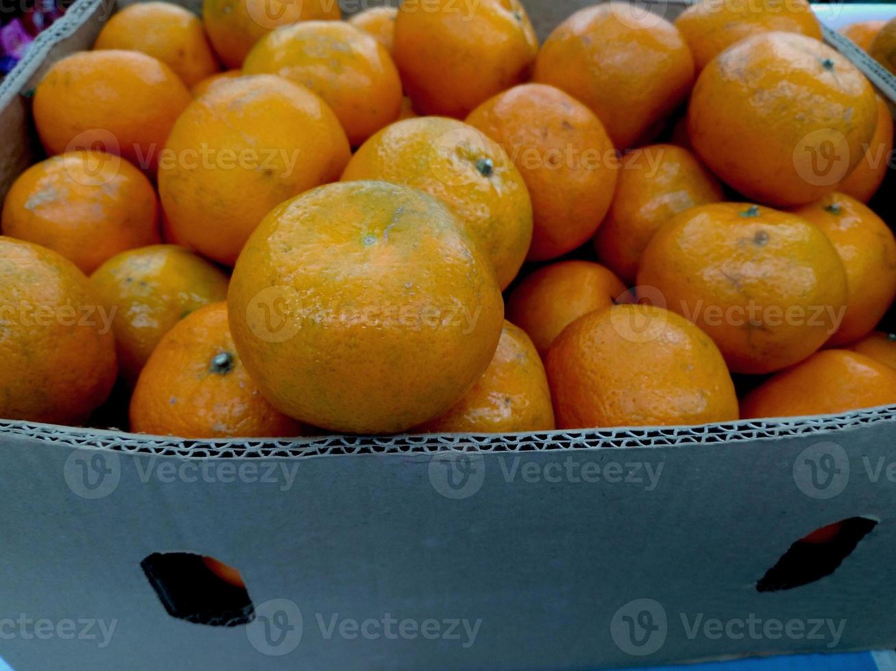 gesunde Früchte, Orangenfrüchte Hintergrund Viele orange Früchte - Orangenfrucht Hintergrund foto