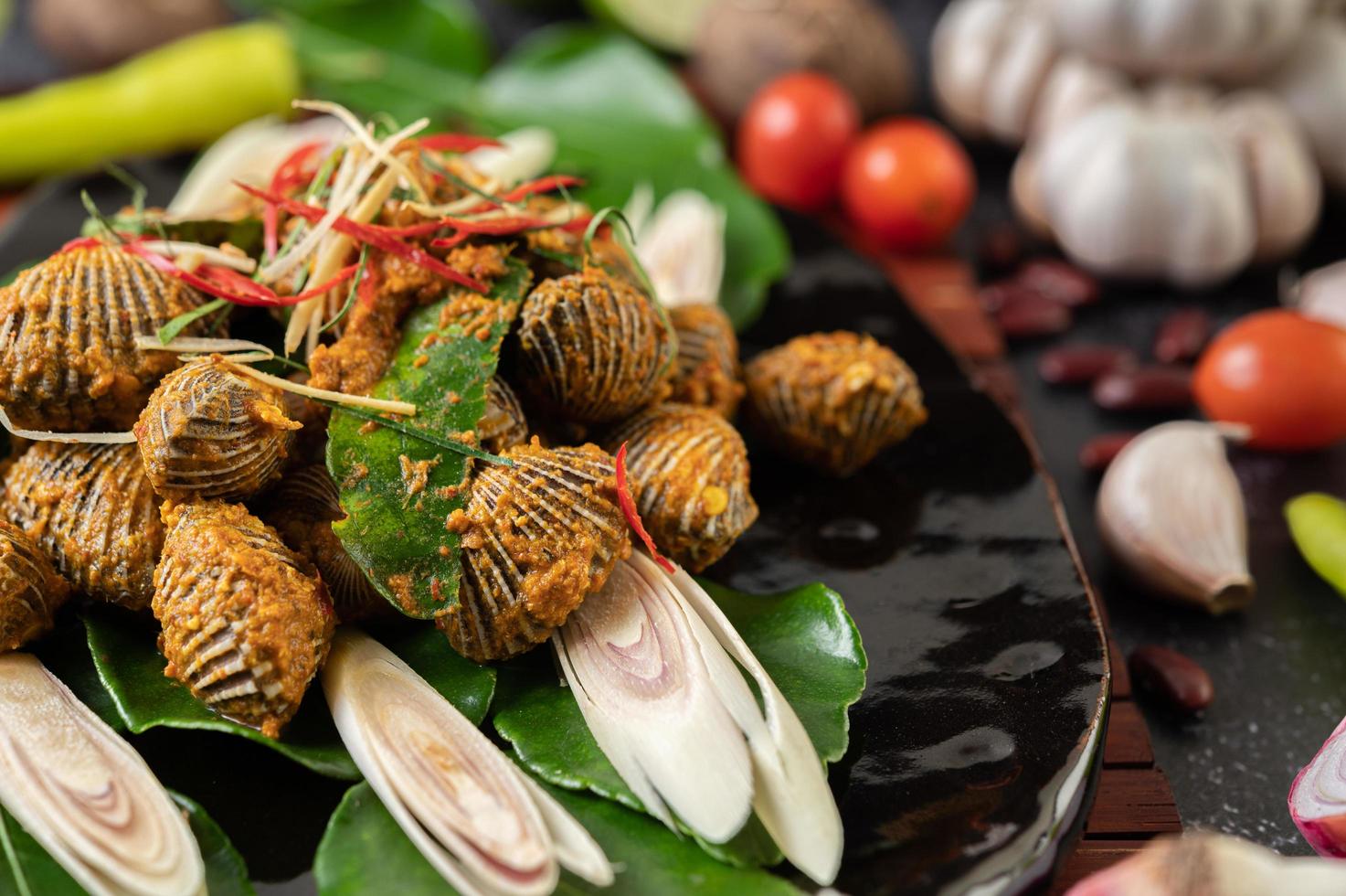 Curry- und sautierte Herzmuscheln foto