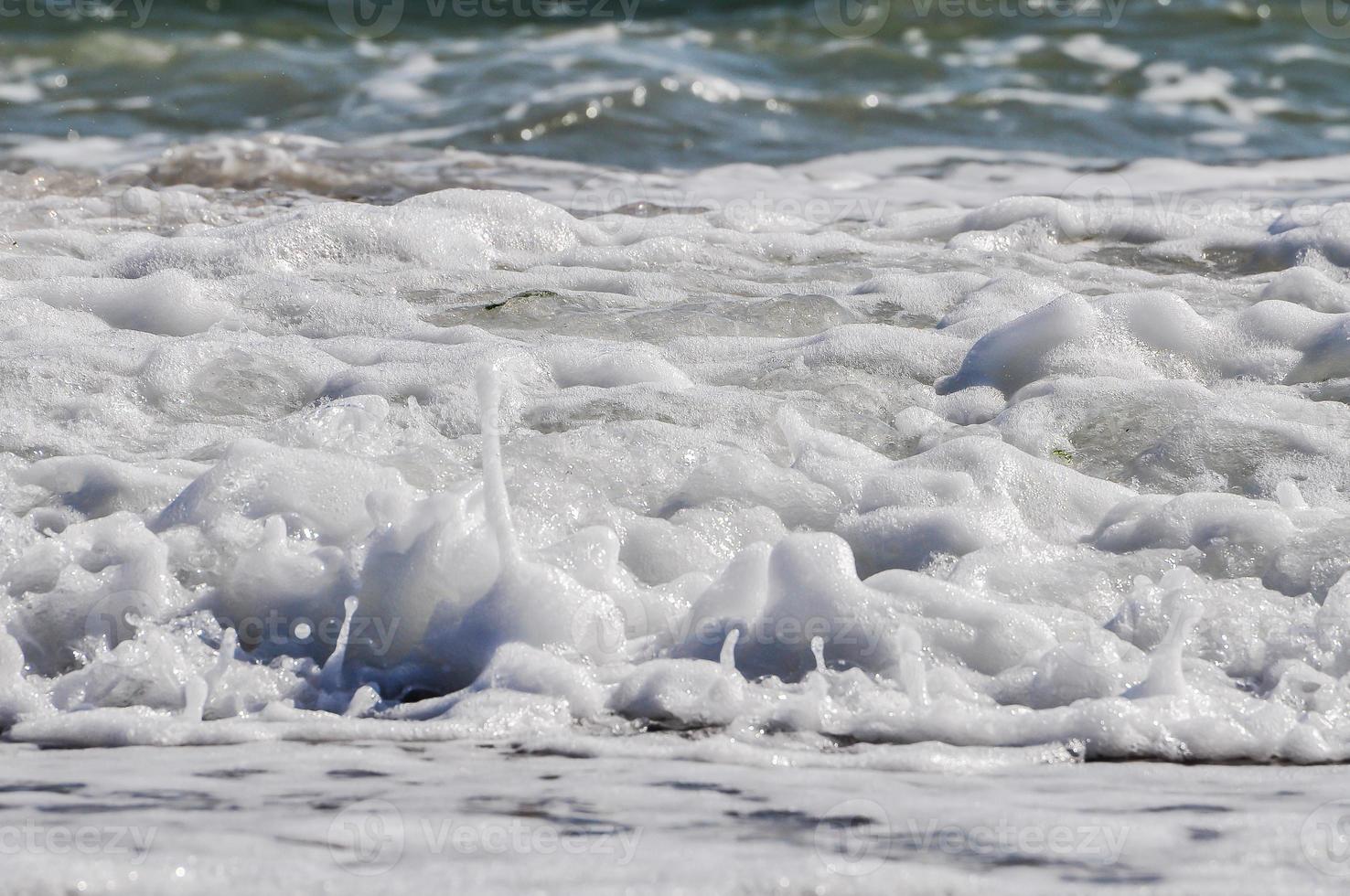 Meeresschaum. Spritzwasser foto