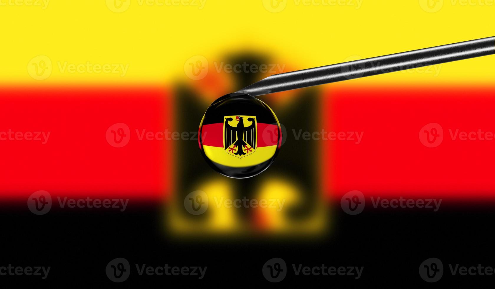 impfspritze mit tropfen auf der nadel vor nationalflagge von deutschland hintergrund. medizinisches Konzept Impfung. coronavirus sars-cov-2 pandemieschutz. Nationale Sicherheitsidee. foto