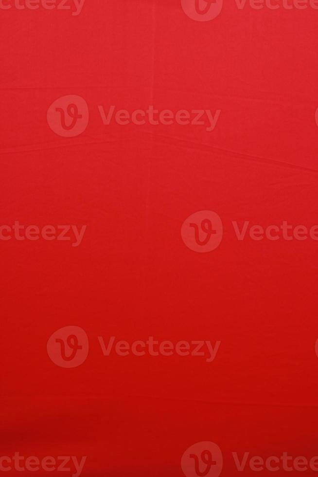 rote Stoff Polyester Textur und Textilhintergrund. foto