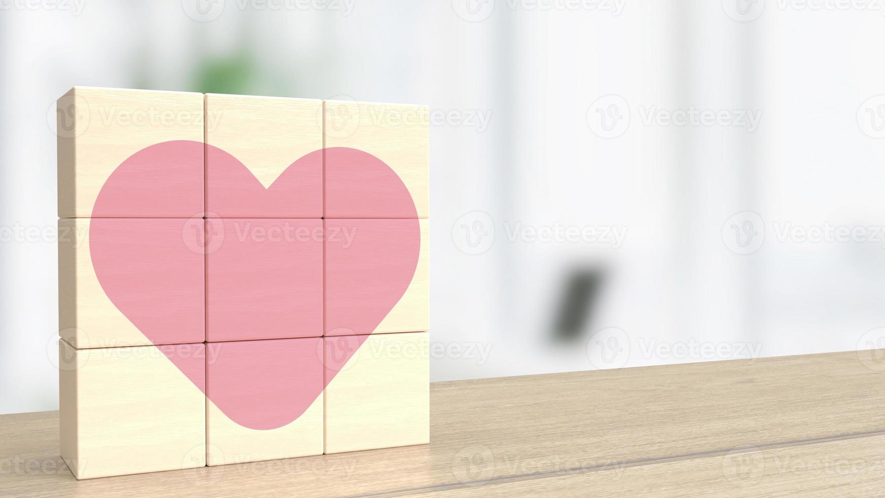 der holzwürfel und das rosa herz für valentinstag oder liebeskonzept 3d foto