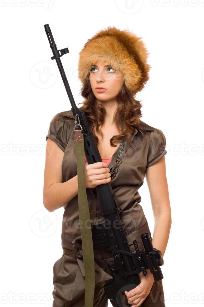 heiße Frau mit einem Gewehr foto