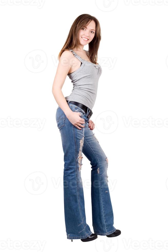 hübsche junge Frau in Blue Jeans. isoliert foto