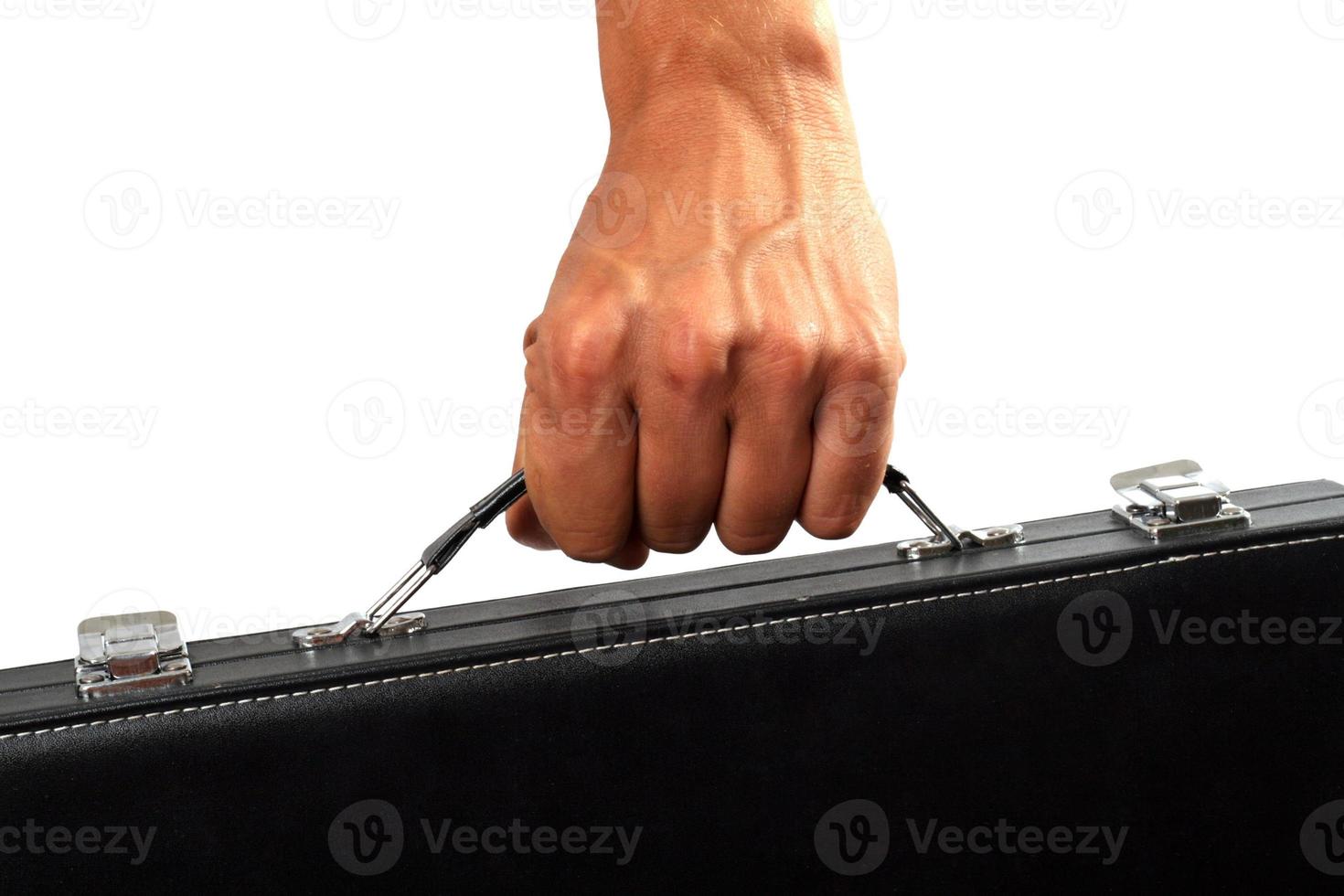 Hand mit einem schwarzen Koffer. isoliert auf weiß foto